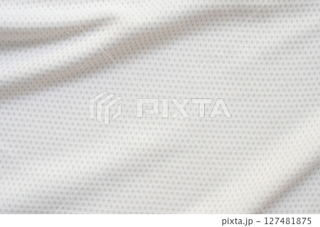 White sports clothing fabric football shirt jersey texture abstract background White sports clothing fabric football shirt jersey texture abstract background 127481875