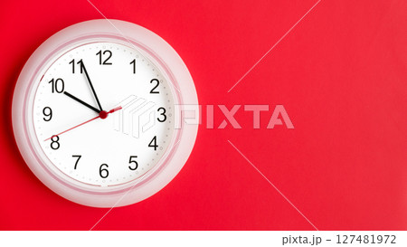 clock on wall showing ten hours 127481972