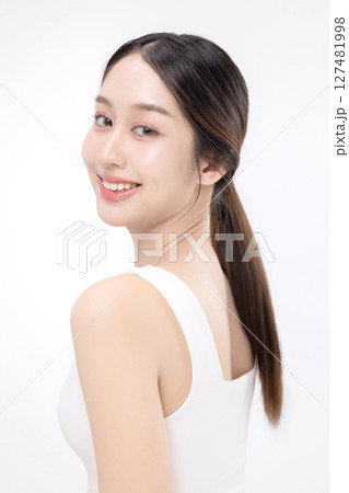Beauty portrait of happy Asian female face with natural skin make up isolated on white background. 127481998