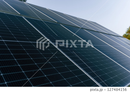 At sunny daytime. Close-up view of solar cell farm power plant eco technology 127484156