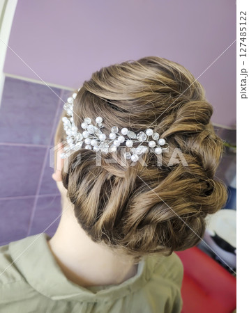 Festive and wedding hairstyles and styling. Light and dark hair 127485122