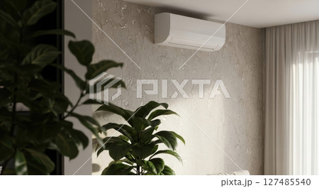 White air conditioner unit mounted on a textured wall in a modern home interior 127485540