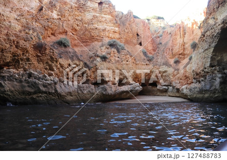 Hidden Sea Cave in Algarve, Portugal - Coastal Beauty 127488783