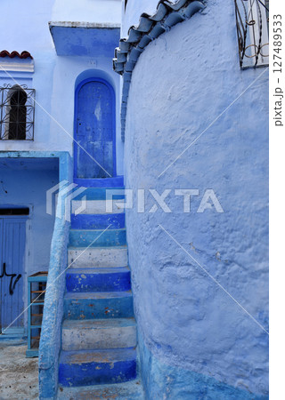 Streets and houses of Chefchaouen, Morocco painted in blue, medieval Unesco heritage 127489533