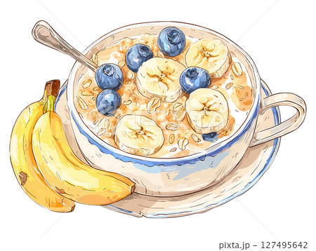 Oatmeal bowl with banana slices and blueberries served with fresh bananas for breakfast 127495642