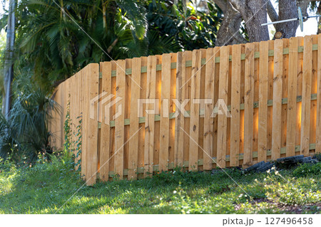 Privacy fence surrounding private property grounds for backyard protection in southern Florida Privacy fence surrounding private property grounds for backyard protection in southern Florida 127496458