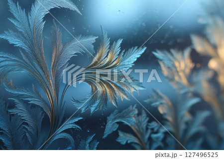 Frost patterns on window glass in cold winter light 127496525