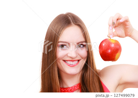 Woman charming girl colorful makeup holds apple fruit Woman charming girl colorful makeup holds apple fruit 127499079