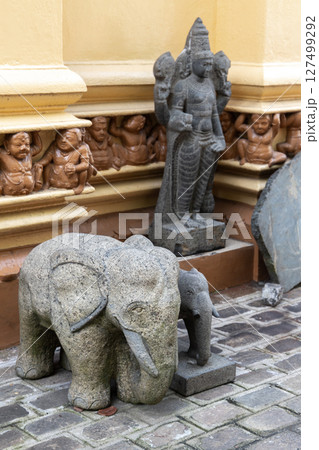 Gangaramaya Temple, Colombo, Sri Lanka. Intricately crafted stone elephants Gangaramaya Temple, Colombo, Sri Lanka. Intricately crafted stone elephants 127499292