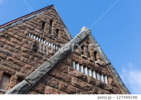 Close-up of a historic brick and stone building facade Close-up of a historic brick and stone building facade 127499296
