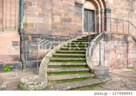 Stone old steps in ancient famous castle. Colorful fall landscape with stone stairs and architecture. Stone old steps in ancient famous castle. Colorful fall landscape with stone stairs and architecture. 127499943