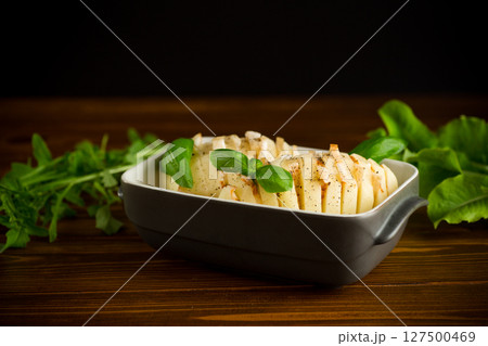 Still life of raw potatoes with lard in the kitchen Still life of raw potatoes with lard in the kitchen 127500469