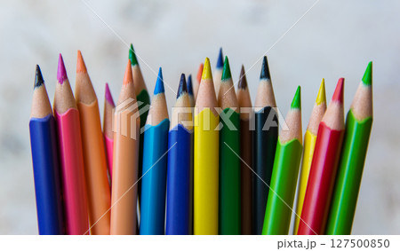 Much color pencils on the light natural background. Close up. Design concept.  127500850