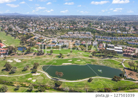 Aerial view of golf surrounded by villas and condos with golf in Carlsbad, North County San Diego 127501039
