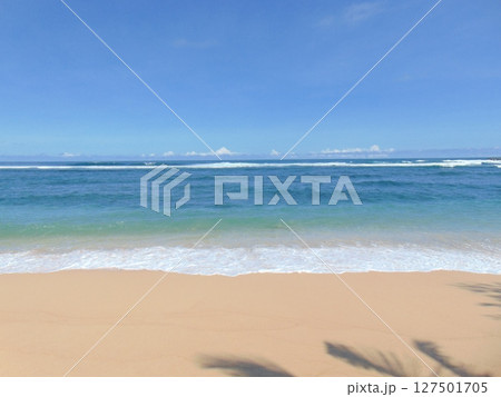 beach with waves in the sand 127501705