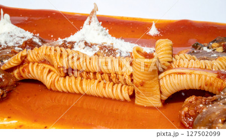 Italian pasta bridge spanning tomato sauce river with Parmesan snow capped mountains. Generated Image 127502099