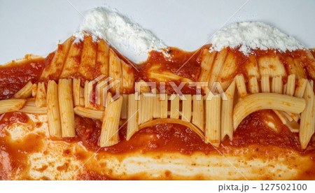 Italian pasta bridge spanning tomato sauce river with Parmesan snow capped mountains. Generated Image 127502100