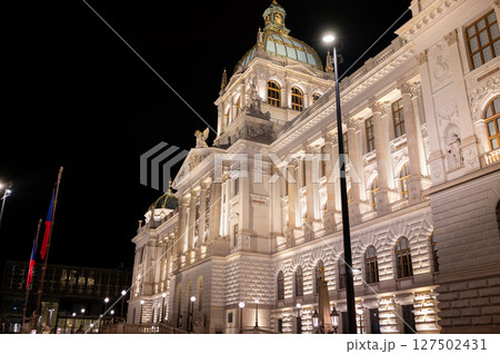 Prague, Czech Republic, August 4, 2023. Night shot with the imposing facade of the National Museum seen from three-quarters. Travel destinations. 127502431