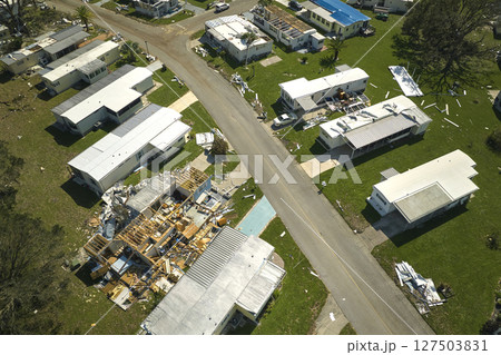 Destroyed by hurricane Ian suburban houses in Florida mobile home residential area. Consequences of natural disaster Destroyed by hurricane Ian suburban houses in Florida mobile home residential area. Consequences of natural disaster 127503831