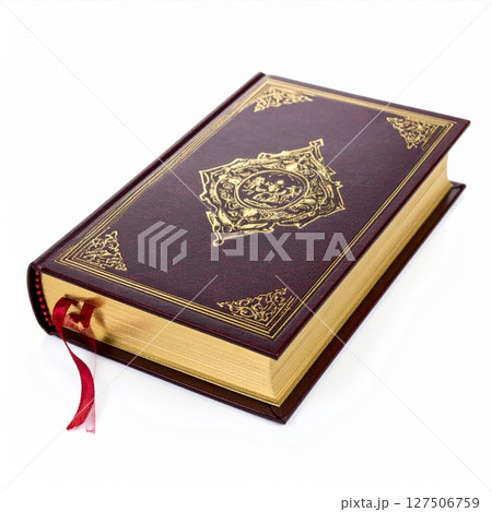 Ornate Maroon and Gold Religious Book on White Background 127506759