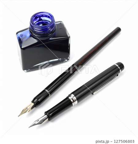 Black Fountain Pens and Blue Ink Bottle on White Background 127506803