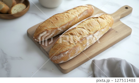 Gluten free sourdough baguette healthy snack food on wooden board 127511488
