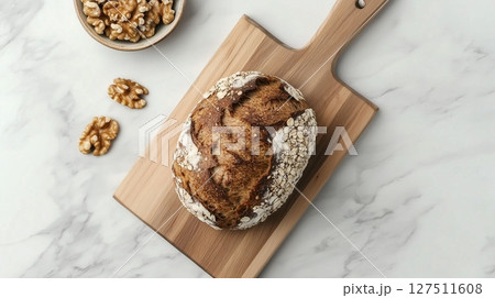 Gluten free bread sourdough with buckwheat and walnut on wooden board 127511608