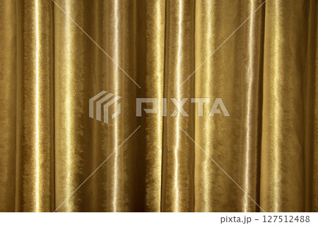Transparent curtain on window. Gold Curtain background 127512488