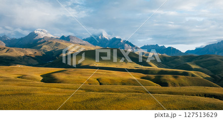 High altitude grassland and snow capped mountain in Sichuan, China 127513629
