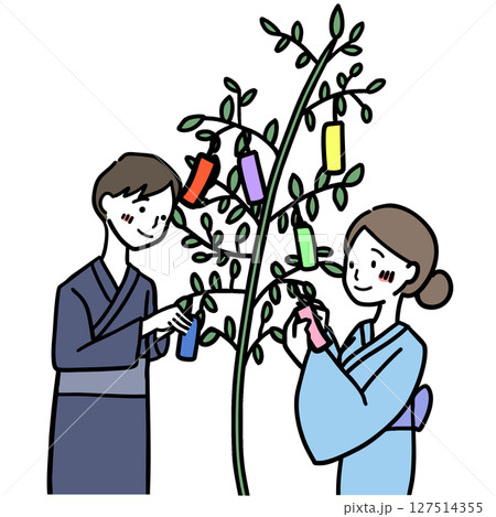 短冊に願い事をする男女 127514355