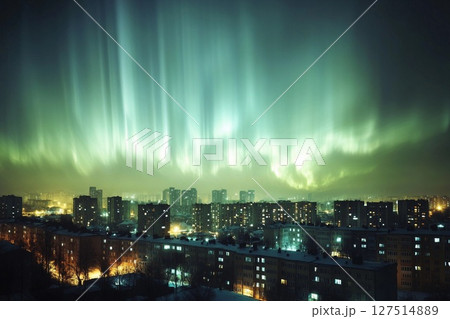 Aurora-like phenomenon illuminates city skyline with vibrant lights against a darkening twilight backdrop 127514889