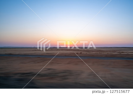 Stunning Sunrise Over the Desert Landscape Near Aswan, Egypt. 127515677