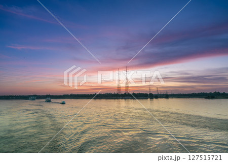 Power Lines Over Nile River at Sunset Near Esna Lock Egypt 127515721
