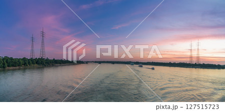 Power Lines Over Nile River at Sunset Near Esna Lock Egypt Power Lines Over Nile River at Sunset Near Esna Lock Egypt 127515723