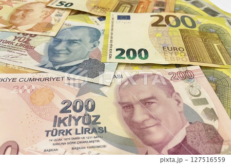 Turkish Lira and Euro banknotes side by side, representing currency exchange, finance, and global economy. Turkish Lira and Euro banknotes side by side, representing currency exchange, finance, and global economy. 127516559