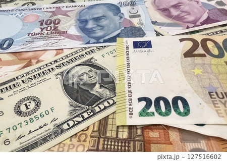 Euro, Dollar and Turkish Lira paper currency.international finance, global economy, forex, cash, and money concept.Close-up of Euro, US Dollar, and Turkish Lira bills symbolizing global economy Euro, Dollar and Turkish Lira paper currency.international finance, global economy, forex, cash, and money concept.Close-up of Euro, US Dollar, and Turkish Lira bills symbolizing global economy 127516602