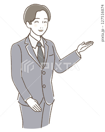 手をあげて笑顔で案内するスーツの男性 手をあげて笑顔で案内するスーツの男性 127516874