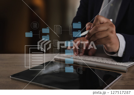 Office files report document person business suit organizes digital folders and files tablet with stylus, symbolizing data management and digital Office files report document person business suit organizes digital folders and files tablet with stylus, symbolizing data management and digital 127517287