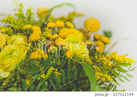 Summer flowers, green and yellow background 127522144