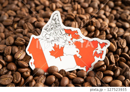 Canada flag on coffee bean, import export trade online commerce. Canada flag on coffee bean, import export trade online commerce. 127523935