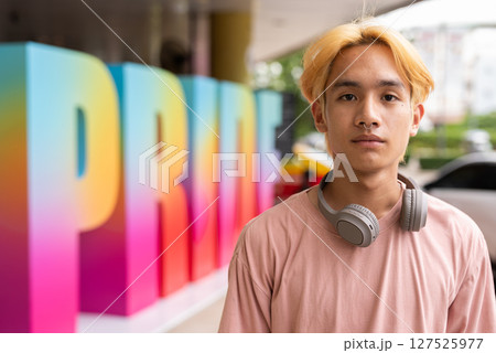 Prdie portrait of confident young teenage gay man Prdie portrait of confident young teenage gay man 127525977