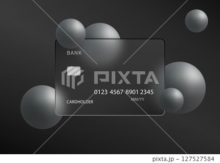 Dark glass credit card with silver spheres on black background 127527584