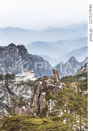 Flying Rock formation peak at Huangshan or Yellow Mountain, popular tourism landmark in China Flying Rock formation peak at Huangshan or Yellow Mountain, popular tourism landmark in China 127527646