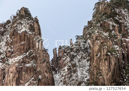 Two Men Playing Chess formation at on granite mountain at Huangshan or Yellow Mountain, popular tourism landmark in China 127527654