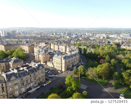 Glasgow is Scotland largest city in the UK, featuring historic, artistic charm with beautiful Victorian architecture and the Clyde River. 127528455