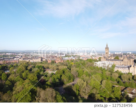 Glasgow is Scotland largest city in the UK, featuring historic, artistic charm with beautiful Victorian architecture and the Clyde River. 127528456