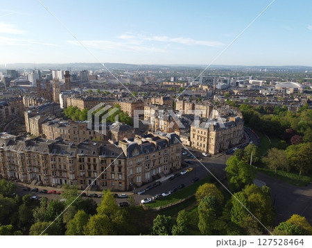 Glasgow is Scotland largest city in the UK, featuring historic, artistic charm with beautiful Victorian architecture and the Clyde River. 127528464