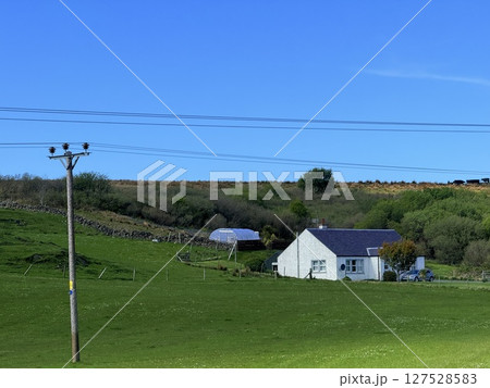 Islay island is located off Scotland west coast renowned for whisky distilleries and birdwatching. Numerous distilleries and diverse migratory birds make it a captivating destination. Islay island is located off Scotland west coast renowned for whisky distilleries and birdwatching. Numerous distilleries and diverse migratory birds make it a captivating destination. 127528583