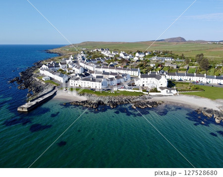Port Charlotte is a town on the west coast of Islay, Scotland. Whisky distilleries and hotels dot the area, with scenic shorelines and historic charm. Port Charlotte is a town on the west coast of Islay, Scotland. Whisky distilleries and hotels dot the area, with scenic shorelines and historic charm. 127528680