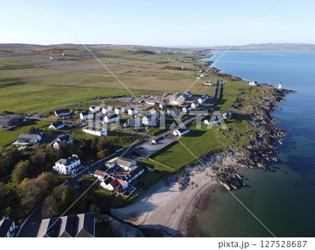 Port Charlotte is a town on the west coast of Islay, Scotland. Whisky distilleries and hotels dot the area, with scenic shorelines and historic charm. 127528687